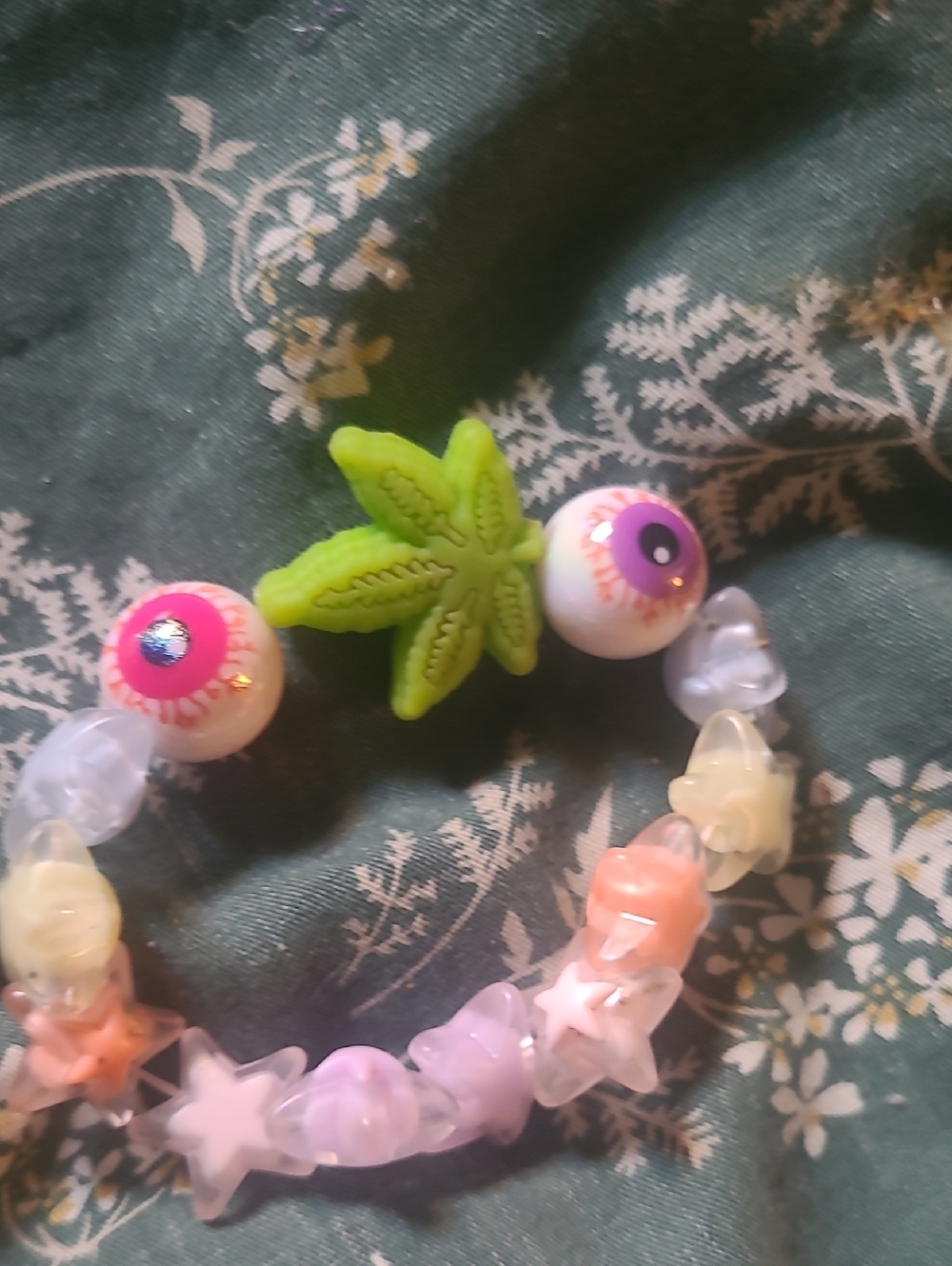 Kid Core Multi-Color Star & Eye Bead Bracelet with Green Leaf Charm